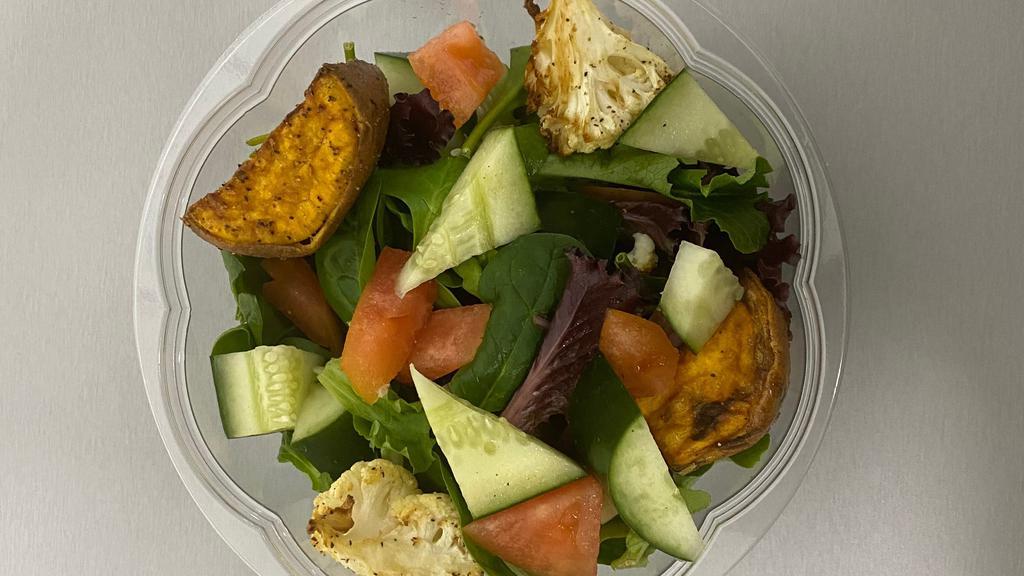 Veggie Bowl · Spring Mix Salad, Tomatoes, Cucumber, Cranberries, With (2) side - Couscous or Rice & Peas or Basmati Rice or Quinoa, Roasted Sweet Potato, Red Wine Vinegar Dressing.