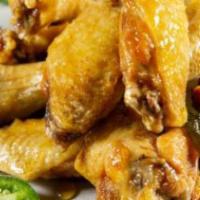 Chipotle Lime Wings · Seven pieces. Flavorful classic and deep fried bone in wings tossed in chipotle lime wings s...