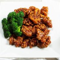 General Tao'S Chicken · crispy golden tender chicken cooked in a mildly seasoned sauce. *Come w/a Small White Rice