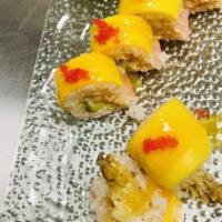 Golden Dragon Roll · Shrimp tempura lobster salad wrapped in soy paper topped with mango tiene chili sauce & red ...