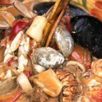 Cazuela De Mariscos · Seafood casserole.