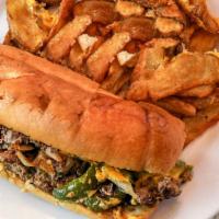 Philly Cheese Steak · Lean roast beef with melted cheese, Grilled onions and peppers.