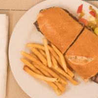 Large Cheese Steak With Fries · Large cheese steak sandwich served with fries