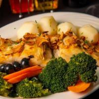 Broiled Codfish · Broiled codfish, served with garlic, olive oil, boiled potatoes and vegetables.