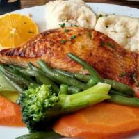 Grilled Salmon  · Grilled Salmon served with boiled potatoes and vegetables.