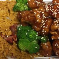 Sesame Chicken Combination Plate · Hot and spicy. Served with pork fried rice and egg roll or soup or soda.