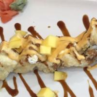 Crazy Roll · Crab meat, avocado inside with cream cheese on top, white roll lightly fried with mango, eel...