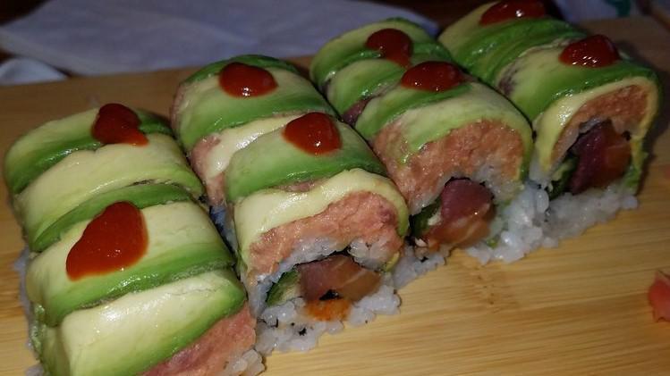 Hot Mama Roll · Tuna, salmon and jalapeno inside with spicy tuna on top double top with avocado.
