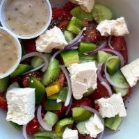 Greek Salad · Tomatoes, red onions, cucumber, green bell peppers, feta cheese, dried oregano, red wine vin...