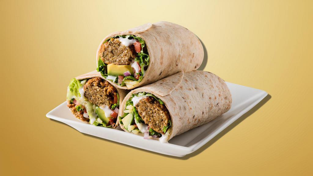 Happy Hummus Wrap · Hummus mixed with tahini sauce, lemon juice, olive oil and spices serve in flour tortilla with green salad.