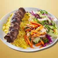 Feast Kabob Plate · Two lamb skewers and one veggie skewer. Served over rice and cucumber salad with pita bread,...