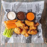Fried Chicken Wings · With carrot and celery. Choices of sauces for wings: BBQ, buffalo, sweet & chili.