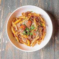 Pasta Bolognese · Penne, ground beef, onion, garlic, tomatoes, red wine, Parmesan, parsley.