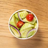 Cucumber Salad · Vegan, gluten free. Cucumber, red onion and cherry tomato.