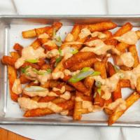 Cajun Fries · Vegetarian, gluten free. Creole spices. Remoulade, green onions.