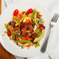Chopped Salad · Gluten free. Romaine, mixed greens, cucumbers, carrots, tomatoes, red onion, bacon, avocado,...