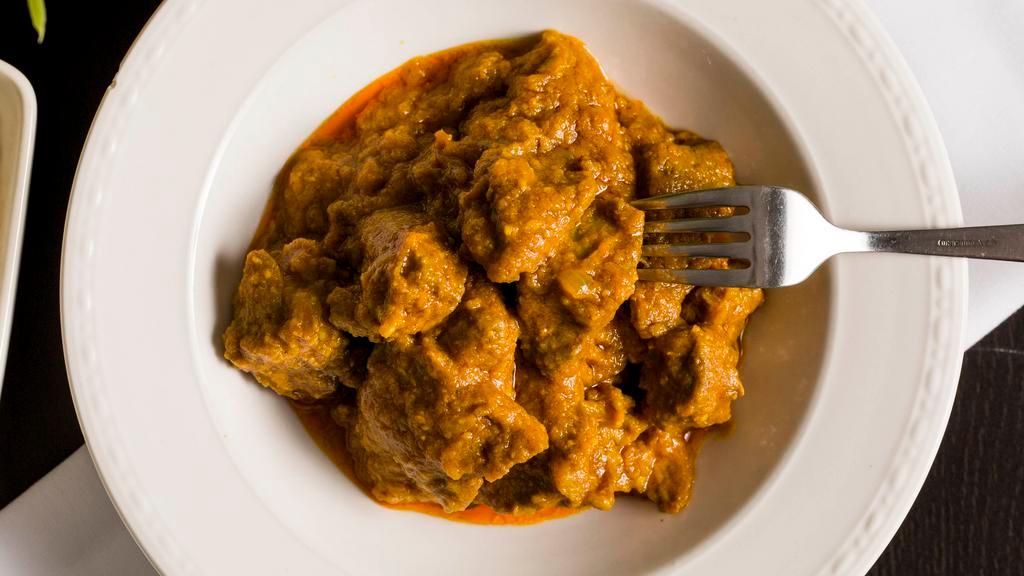 Lamb Curry · Lamb made with onion paste, garam masala and hot spices.