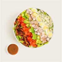 Cobb Salad · Chicken with blue cheese, bacon bits, sliced egg, avocado, tomato, chopped romaine, and bals...