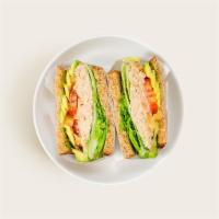 Tuna Avocado Sandwich · Tuna salad with avocado, tomato, lettuce, and bean sprouts on your choice of bread.