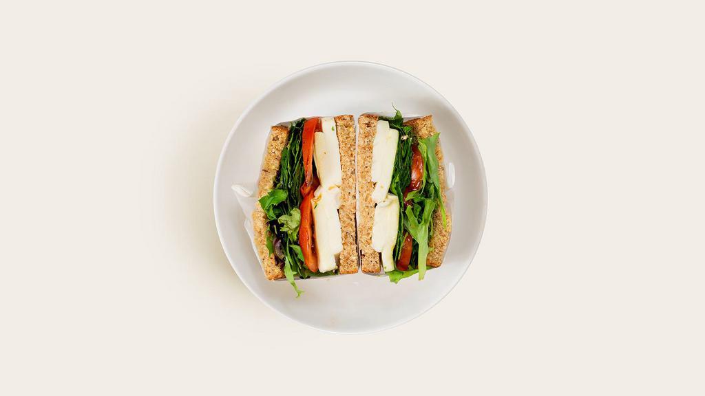 Caprese Sandwich · Fresh mozzarella with tomatoes, mixed greens, basil, and balsamic dressing on your choice of bread.