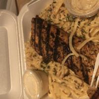 Myrtle Beach Grilled Salmon · Grilled salmon served with our special home made cream sauce.
