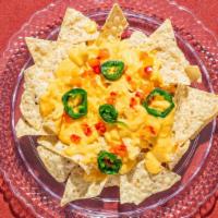 Nacho And Spicy Cheese · Large nachos with cheese