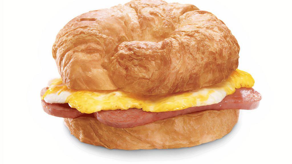 Spam® Croissant Combo · Includes hash browns and your choice of a large drink.