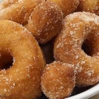 Sugar And Spice Donuts · Airy yeast doughnuts coated in sugar spiced with cinnamon and cardamom. Caramel and Chocolat...