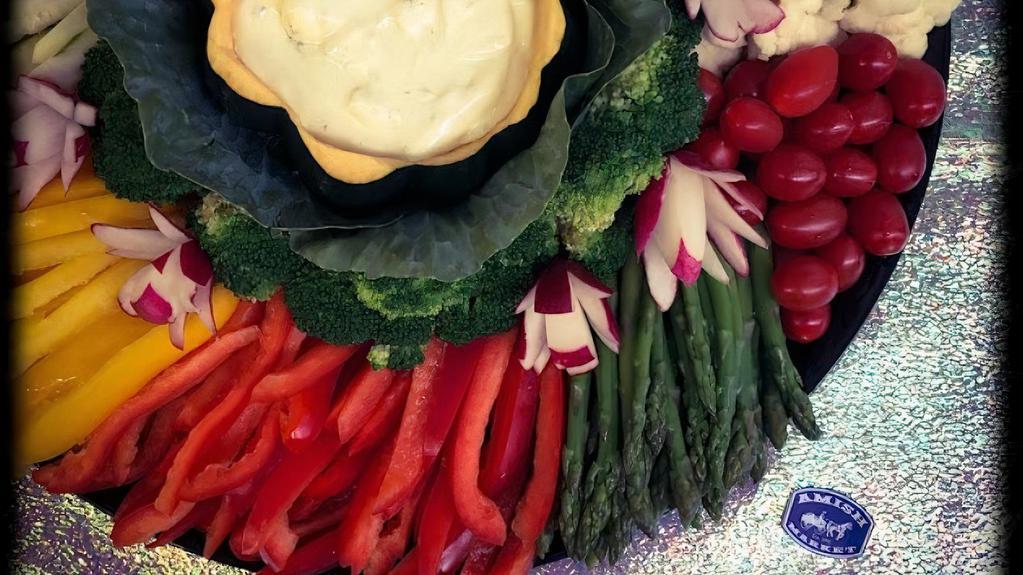 Vegetable Crudite ( Per Person ) · A composition of carrot, and celery sticks, cauliflower and broccoli florets, cherry tomatoes, zucchini and yellow squash served with your choice of dips