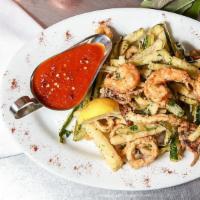 Fritto Misto (Liguria) · Assortment of fried shrimp, calamari and zucchini.