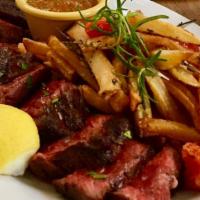 Bistecca E Fritte (Argentina) · Grilled hanger steak and herbed country fries served with chimichurri sauce.