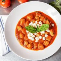Gnocchi Alla Sorrentina (Campania) · Potato dumplings in tomato sauce with basil and fresh mozzarella. 