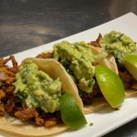 Tacos Al Pastor · Three taquitos w/roasted pork, pineapple & guacamole. ** Corn Tortilla