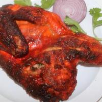 Half Chicken Grilled With Naan · Grilled Chicken marinated with Indian Spices. Served with Al Aqsa Special Sauce.