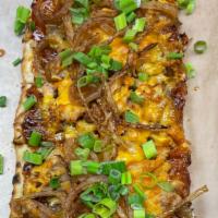 Southern Bbq Chicken Flatbeard · Crispy Italian flatbread, Sweet Baby Rays BBQ Sauce, candied onions, pulled smoked chicken, ...