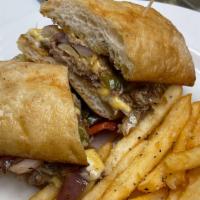 Windsor-Philly Cheese Steak · Shaved ribeye Certified Angus Beef with peppers and onions, topped with provolone cheese, se...