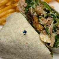 Chicken Caesar Wrap · Grilled  chicken, crisp hearts of romaine lettuce, garlic croutons, parmesan cheese, grape t...