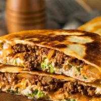 Quesadillas · Flour tortillas stuffed with melted cheese, peppers & onions, served with guacamole, Salsa &...