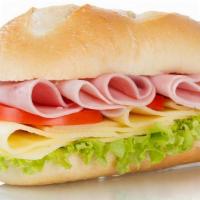 Ham Sandwich · Ham, Lettuce, mayonnaise, tomato, onion on a roll.