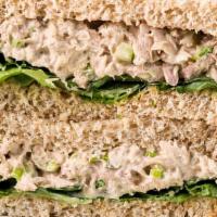 Tuna Salad Club Sandwich · Fresh white Albacore tuna salad loaded with bacon, lettuce and tomato.