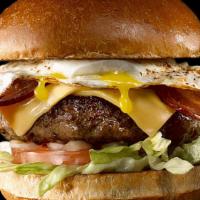 Sunshine Burger · Signature beef patty and bacon with American cheese, fried egg, smoked bacon, lettuce, tomat...