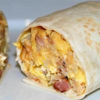 Classic Trio 3 Meat Wrap · Ham, bacon, sausage, scrambled eggs & American cheese, served with hash browns.