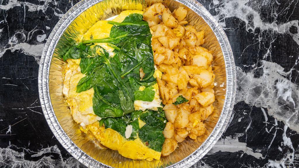 Spinach & Feta Omelette Platter · Made with four eggs; served with your choice of hash browns, home fries or sliced tomato. Includes toast or English muffin with butter. Fresh cut spinach mixed with feta cheese.