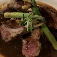 Rack Of Lamb · pan seared and served with broccoli rabe in a roasted garlic cognac demi glaze sauce