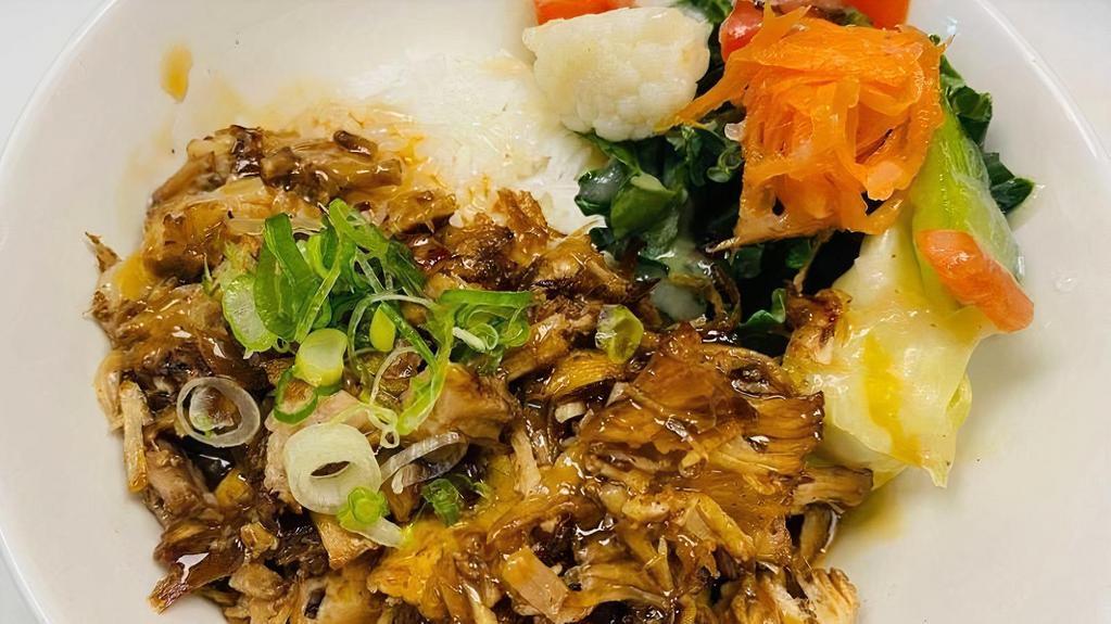 Don Pork Bowl · a perfect starter . . . pulled pork on top of steamed white rice, sake soy glaze, pickled vegetables + kale with miso dressing