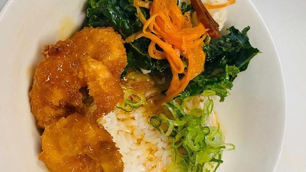 Don Shrimp Bowl · a perfect starter . . . crispy panko shrimp on top of steamed white rice, sake soy glaze, pickled vegetables + kale with miso dressing
