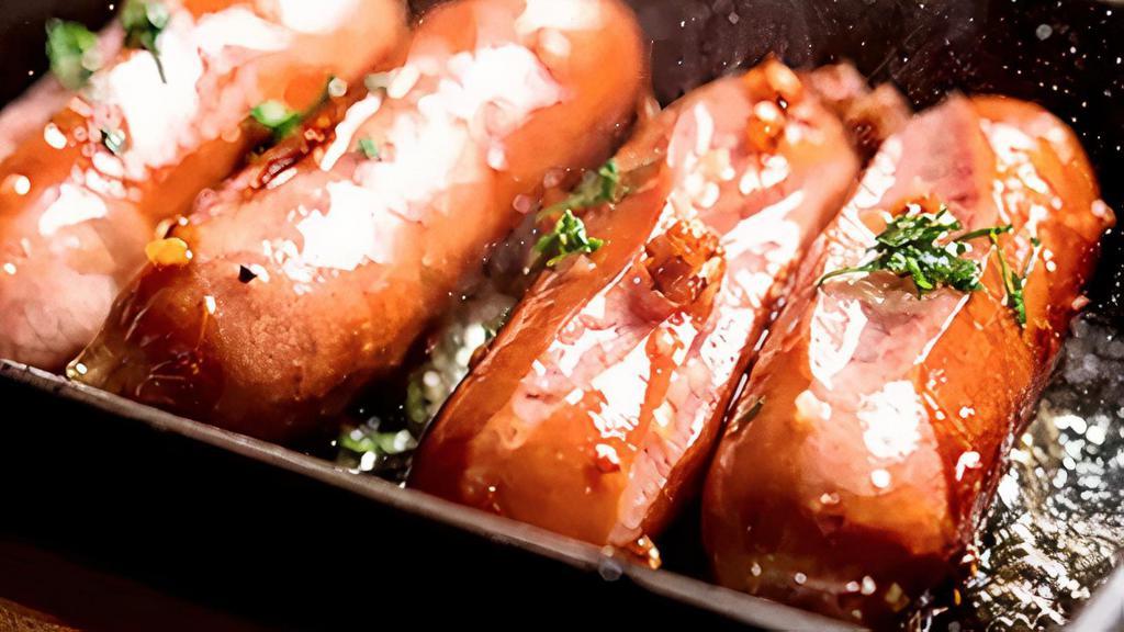 Kurobuta Sausage · Japanese Berkshire sausage with sweet & spicy glaze (4 pieces) ;. All locations - 4 pieces  except . BFPL(QSR)  - 3 pieces ;