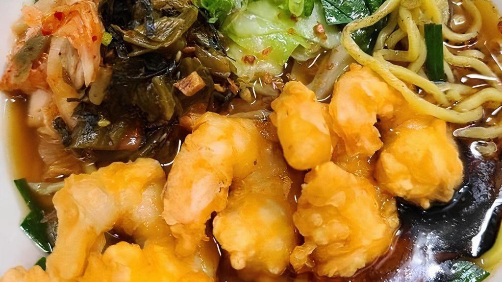 Shrimp Tempura Kimchi Ramen · classic chicken broth, shoyu & kimchi tare, topped with shrimp tempura, cabbage, scallions, chives, kimchi + pickled mustard greens.