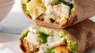 Chicken Caesar Wrap · Chicken, tomatoes, shaved Romano and homemade croutons, romaine, and caesar dressing.