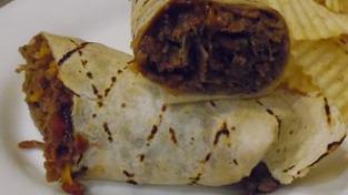 Balboa Wrap · Stuffed with marinated steak and grilled chicken, portobello mushrooms, roasted peppers, fre...
